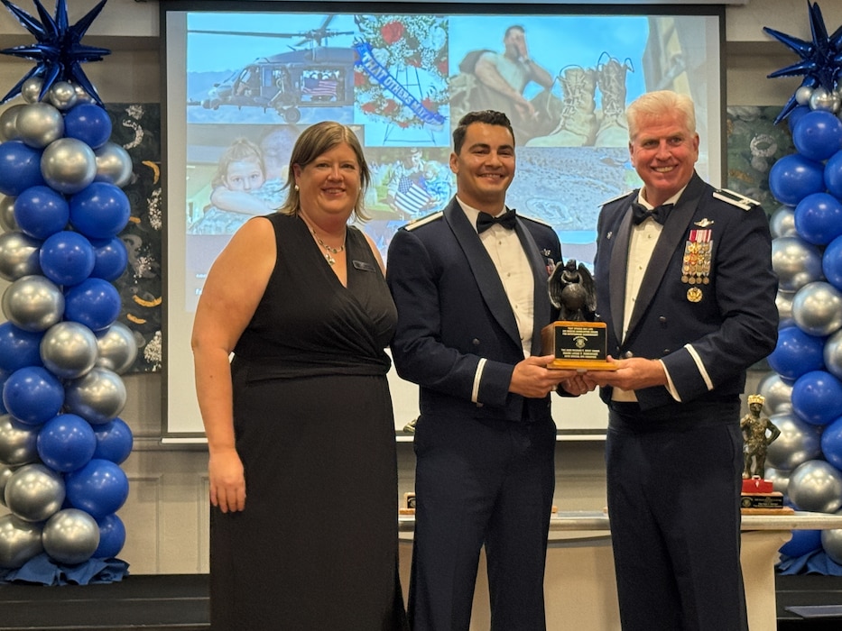 Group of people pose for a photo.