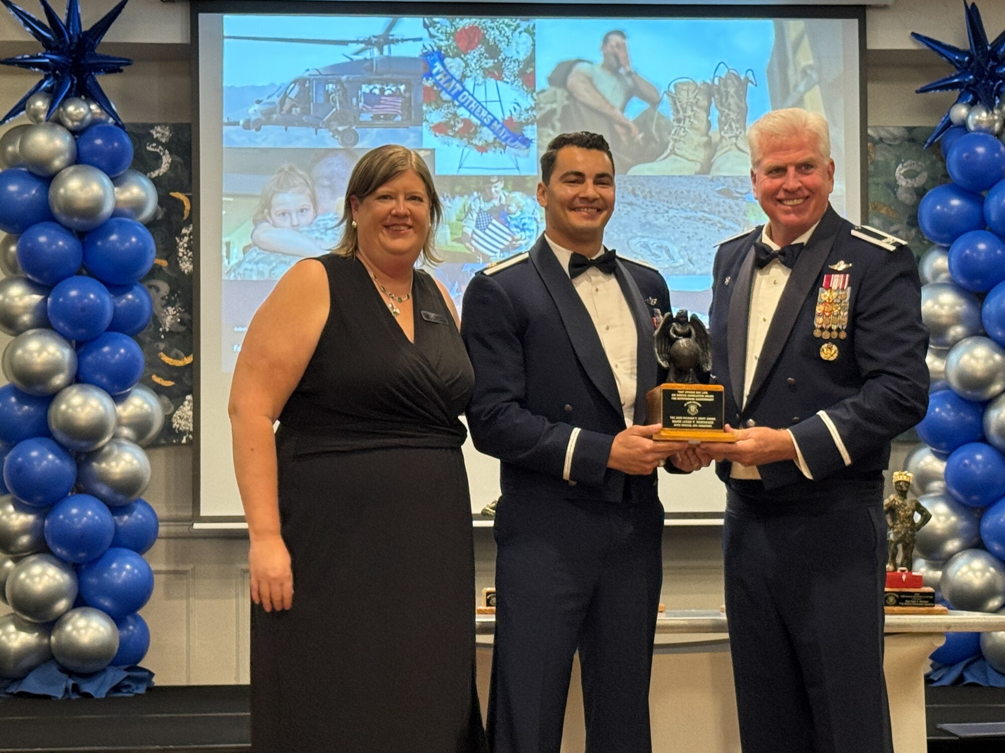 Group of people pose for a photo.