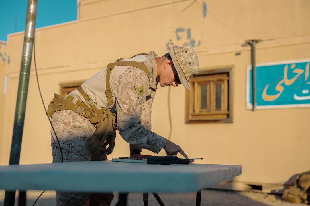 U.S. Marine Corps 1st Lt. Thomas Rosenthal, New Jersey native, infantry officer with 3rd Battalion, 7th Marine Regiment, 1st Marine Division, plots grid points at Range 215, Marine Corps Air Ground Combat Center, Twentynine Palms, California, Sept. 22, 2025. Marines with V37 participate in force-on-force training alongside British Royal Marines, leveraging the latest Binocular Niro technologies in dynamic, competitive scenarios, both as allies and adversaries.  (U.S. Marine Corps photo by Lance Cpl. Gracelyn Hanson)