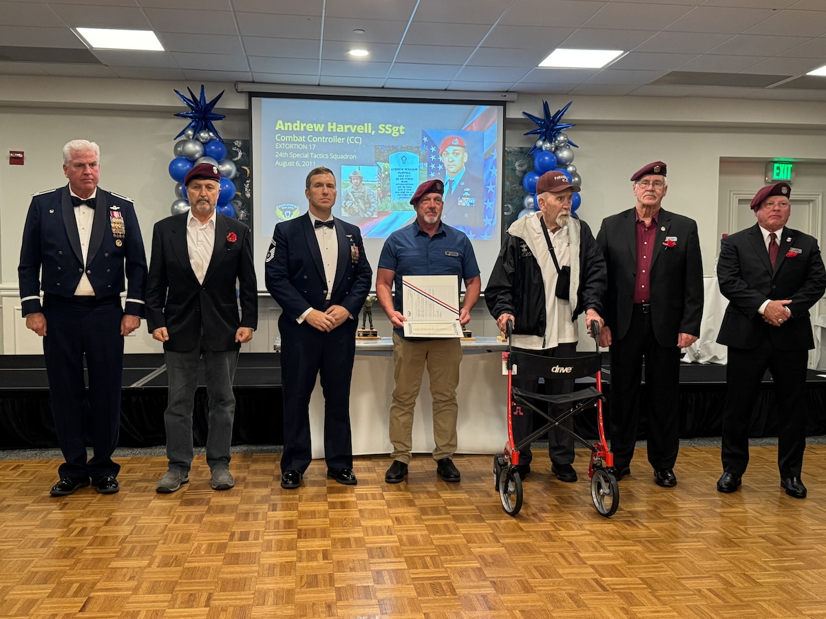 Group of people pose for a photo.