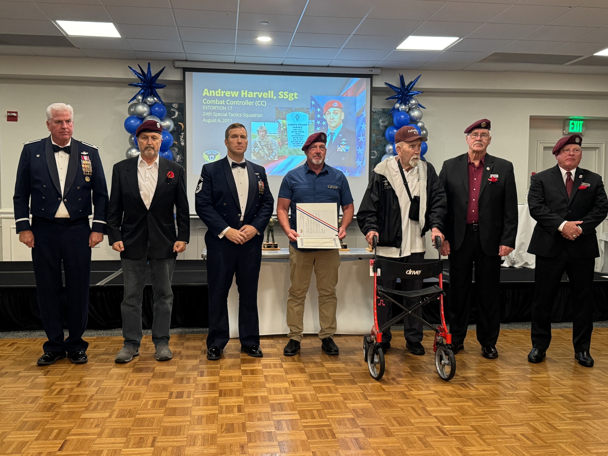 Group of people pose for a photo.