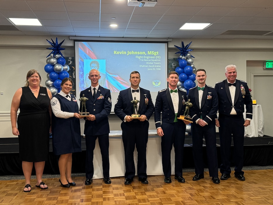 Group of people pose for a photo.