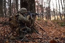 A U.S. Marine Corps student with Company D, Basic Officer Course 4-25, The Basic School, shoots an M16A4 rifle during the Warfighting Field Exercise at Marine Corps Base Quantico, Virginia, Nov. 19, 2025. The WARFEX serves as the culminating event at TBS, evaluating students’ proficiency in decision-making, small-unit tactics, and leadership as they operate under sustained physical and mental pressure in a realistic warfighting scenario. (U.S. Marine Corps photo by Cpl. Joshua Barker)