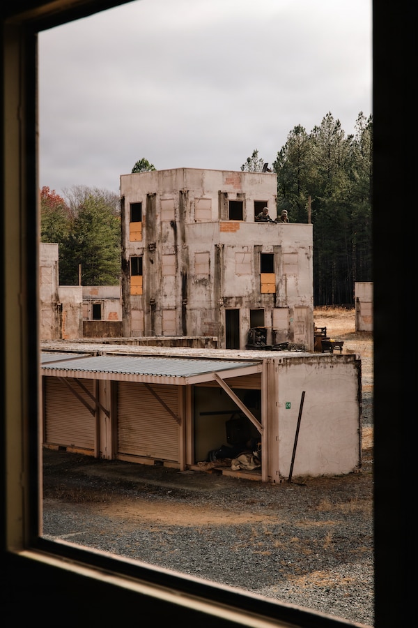 U.S. Marine Corps students with Company D, Basic Officer Course 4-25, The Basic School, communicate to other Marines during the Warfighting Field Exercise on Marine Corps Base Quantico, Virginia, Nov. 19, 2025. The WARFEX serves as the culminating event at TBS, evaluating students’ proficiency in decision-making, small-unit tactics, and leadership as they operate under sustained physical and mental pressure in a realistic warfighting scenario. (U.S. Marine Corps photo by Cpl. Joshua Barker)
