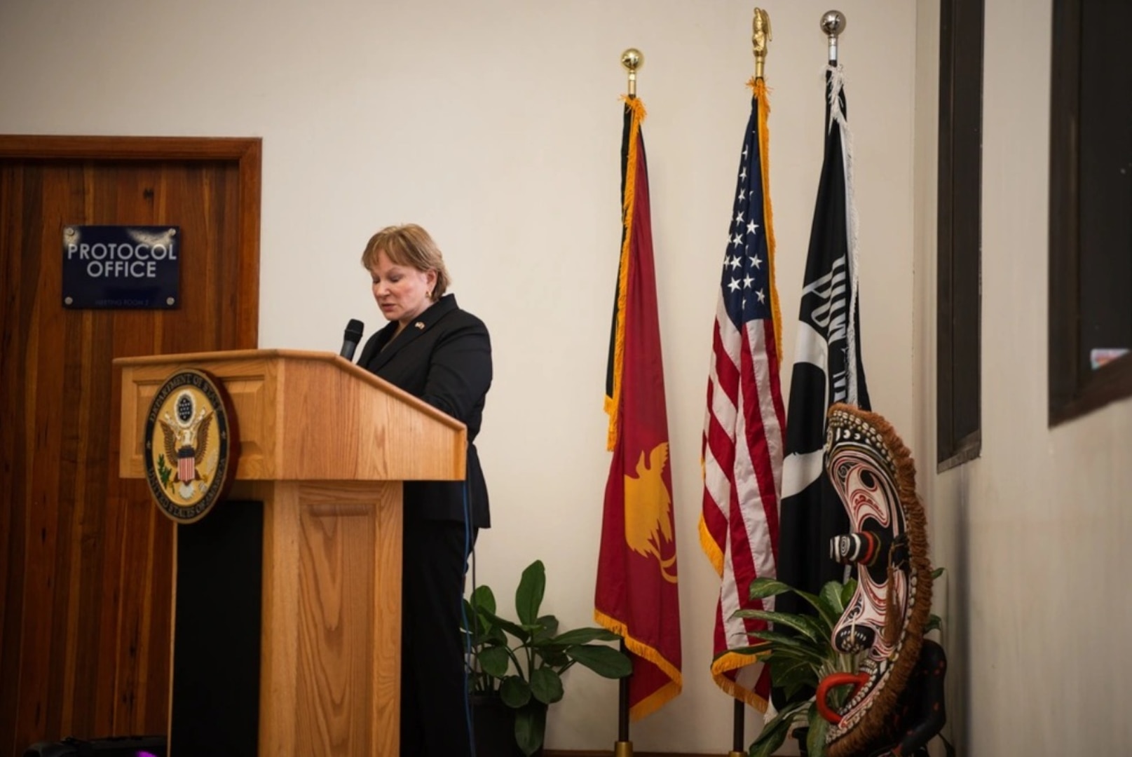 U.S. Ambassador to Papua New Guinea Ann M. Yastishock speaks during a repatriation ceremony in Port Moresby, Papua New Guinea, Sept. 24, 2024. The ceremony oversaw the official transfer of possible remains found during a joint field activity in the country to the Defense POW/MIA Accounting Agency.