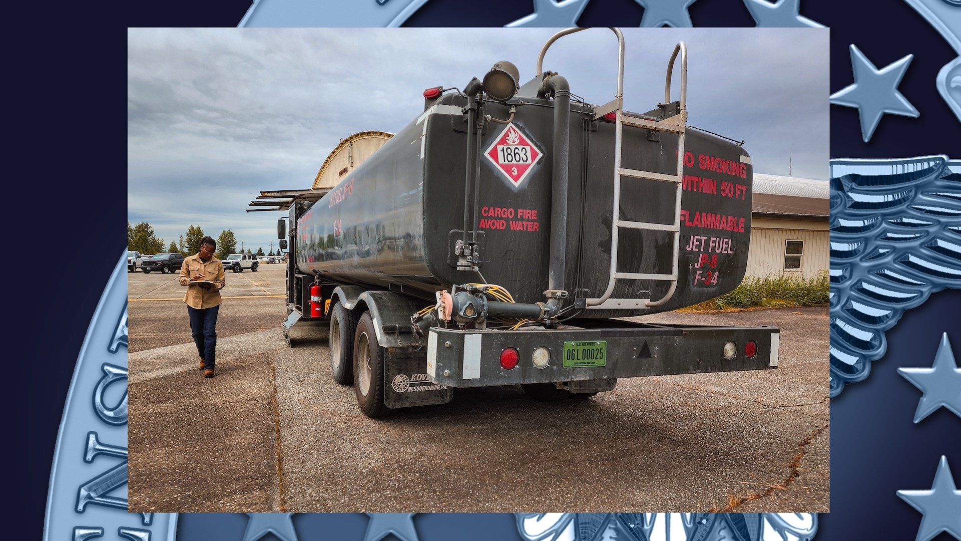 Woman inspects fuel vehicle.