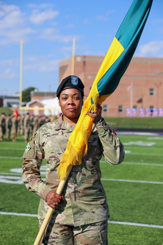 U.S. Army Col. Brandye Williams prepares to pass the colors of the 149th Maneuver Enhancement Brigade (MEB) as she relinquishes command of the brigade to Col. Terry Durham during a ceremony in Richmond, Ky., Oct. 18, 2025.