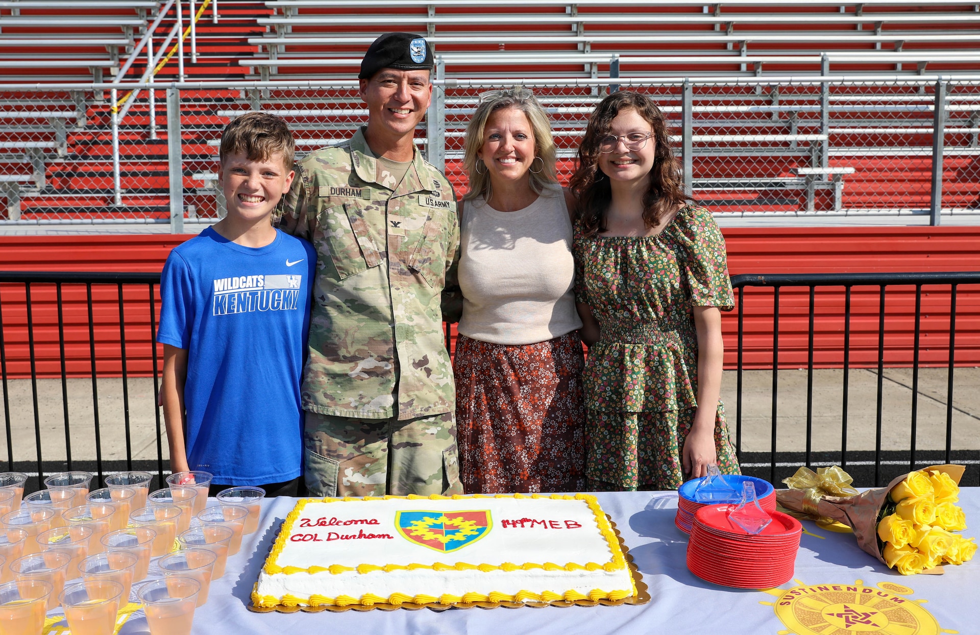 U.S. Army Col. Terry Durham celebrates with his son, Luke; wife, Penny; and daughter, Taylor after assuming command of Kentucky’s 149th Maneuver Enhancement Brigade (MEB) in Richmond, Ky., Oct. 18, 2025.