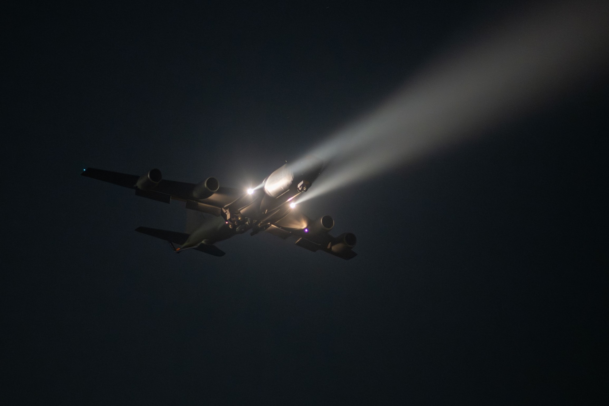 A U.S. Air Force KC-135 Stratotanker assigned to the 305th Air Mobility Wing's Mission Generation Force Element (MGFE) lights up the night sky while flying to an undisclosed location as part of the mobilization of the MGFE, which provided crucial air refueling support to U.S. and allied forces during a milestone seven-month contingency operation. The 305 AMW led and partnered with KC-46 and KC-135 air refueling teams and personnel from 16 Active Duty, Reserve and National Guard units, forming the largest Air Force MGFE in theater and the only MGFE to employ two major weapons systems. The MGFE achieved the highest sortie generation rate in theater, flying more than 3,600 KC-46 and KC-135 missions and offloading more than 150 million pounds of fuel to coalition aircraft supporting contingency operations for four combatant commands. (U.S. Air Force courtesy photo)