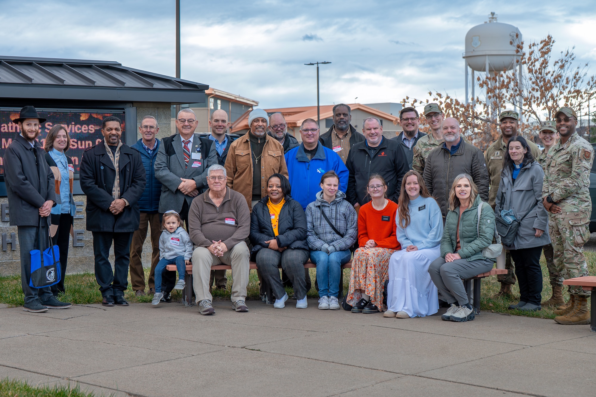 A group of people pose for a photo.