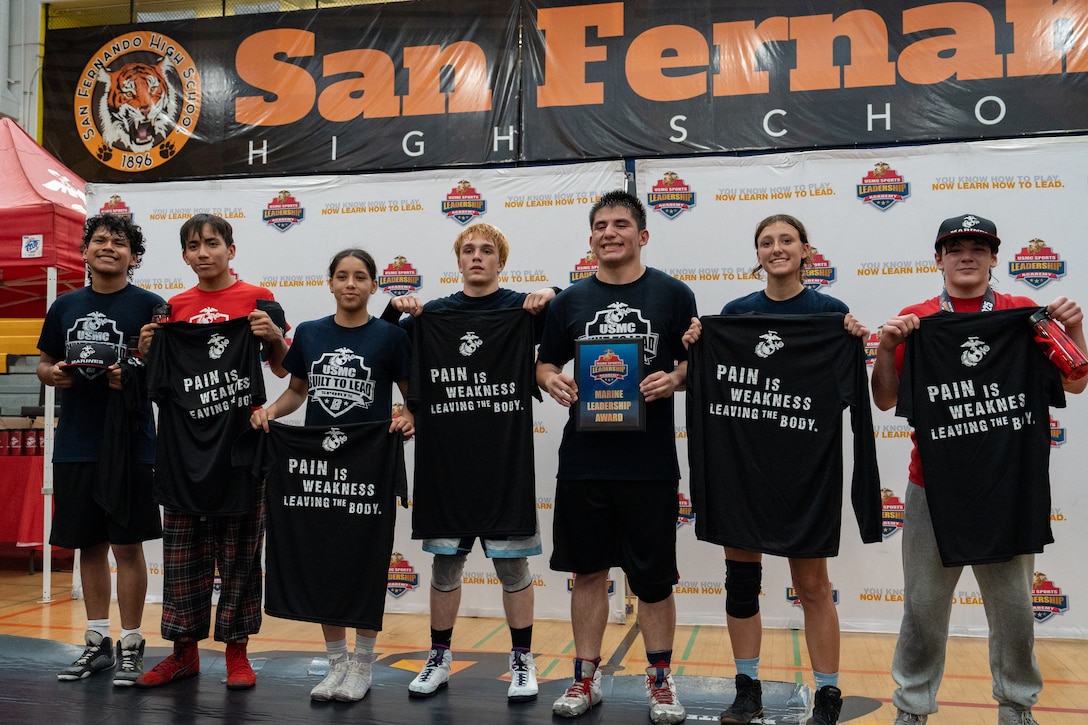 Student athletes participate in a United States Marine Corps Sports Leadership Academy wrestling clinic at San Fernando High School in San Fernando, California, Oct. 25, 2025. The USMC SLA is an organization designed to teach athletes the fundamentals of Marine Corps leadership techniques and skills through sports to help them in their high school sports careers. (U.S. Marine Corps photo by Sgt. Fred Garcia)