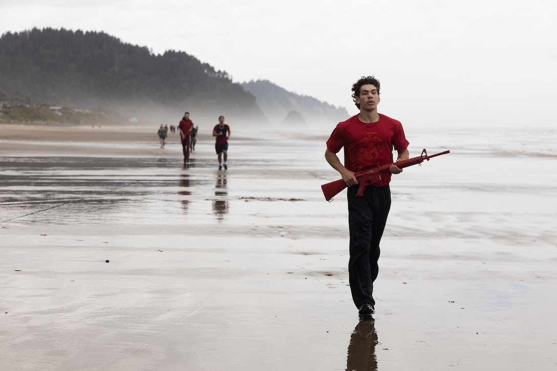 A U.S. Marine Corps poolee with Recruiting Sub-Station Beaverton, Recruiting Station Portland, run on the beach during a physical training session in Arch Cape, Oregon, June 14, 2025. Physical training sessions are conducted to enhance unit morale and foster camaraderie. (U.S. Marine Corps photo by Sgt. Andrew Bray)