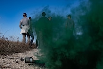 Team Minot Airmen participating in the combat survival training receive training on smoke signals at Garrison, North Dakota, Oct. 9, 2025. In order to prepare for possible hostile scenarios, aircrew members must finish survival, evade, resistance and escape training. (U.S. Air Force photo by Senior Airman Alyssa Bankston)