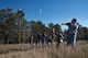 Team Minot Airmen participating in the combat survival training throw explosives at Garrison, North Dakota, Oct. 9, 2025. Aircrew members must complete survival, evade, resistance and escape training to prepare for potential hostile situations. (U.S. Air Force photo by Senior Airman Alyssa Bankston)