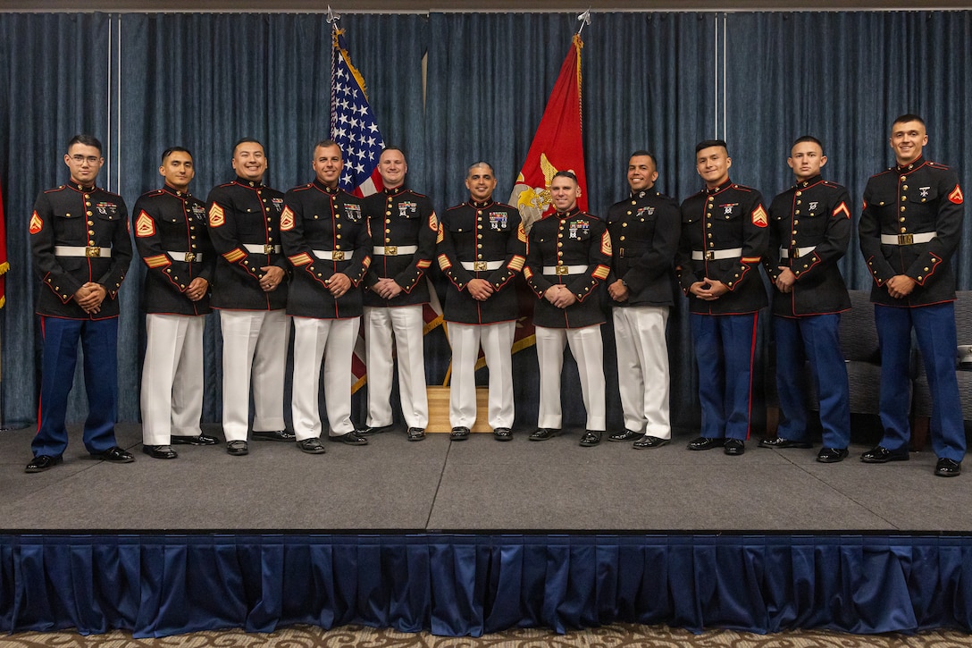 U.S. Marines pose for a photograph at the conclusion of a retirement ceremony at Fairchild Air Force Base in Airway Heights, Washington, October 17, 2025. Sgt. Maj. Gilberto CastilloGuzman, sergeant major of Recruiting Station Seattle, retired after 23 years of honorable service to the United States Marine Corps. (U.S. Marine Corps photo by Sgt. Hunter Wagner)