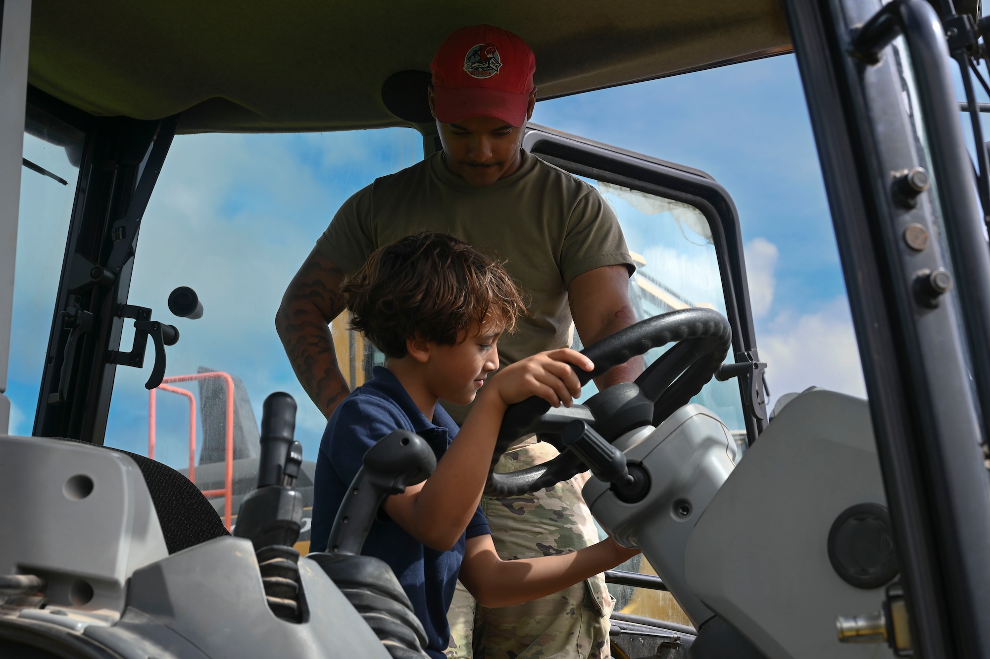 Airmen assigned to the 554th RED HORSE celebrated their unit’s 60th anniversary by hosting Touch-A-Truck, an event focused on connecting with the children on base.