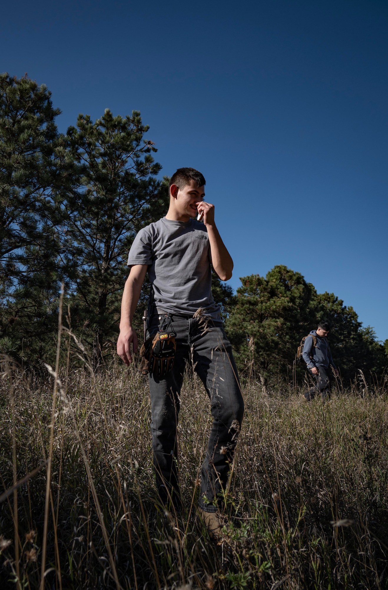 A Team Minot Airman scavenges for resources during combat survival training at Garrison, North Dakota, Oct. 9, 2025. In order to prepare for possible hostile scenarios, aircrew members must finish survival, evade, resistance and escape training. (U.S. Air Force photo by Senior Airman Alyssa Bankston)