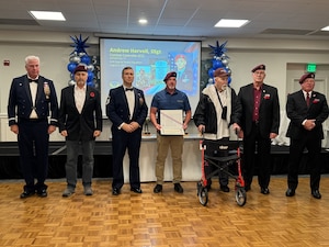 Group of people pose for a photo.