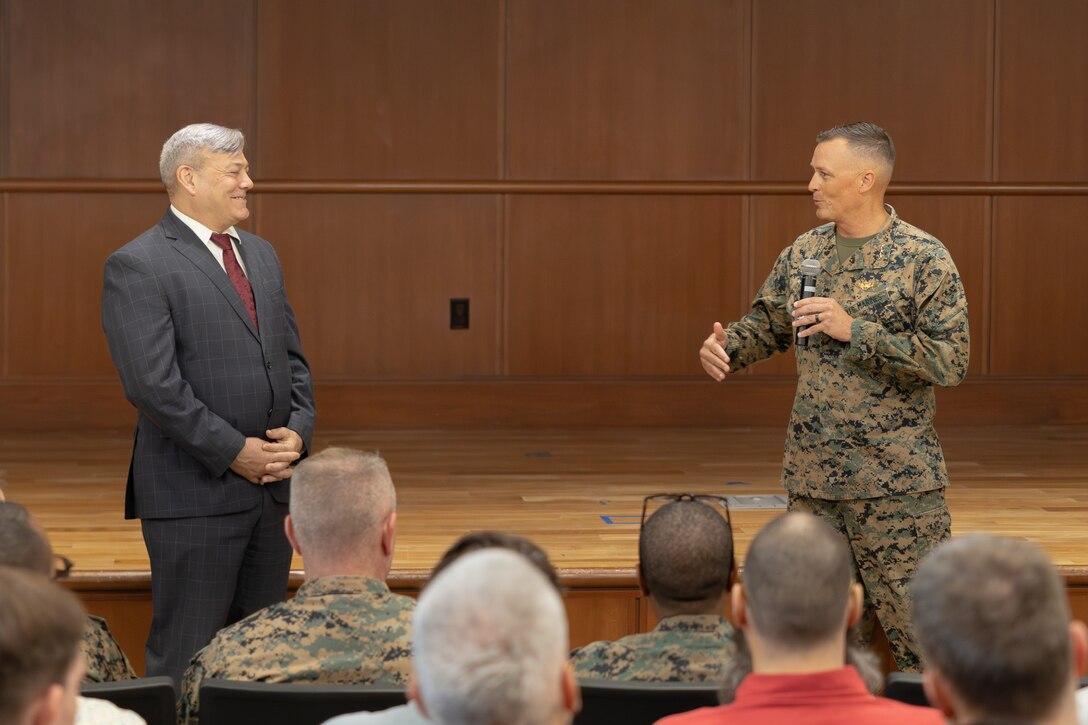 U.S. Marine Corps Lt. Gen. Leonard F. Anderson IV, right, commander of Marine Forces Reserve and Marine Forces South and Gregg Habel, executive director of Marine Forces Reserve and Marine Forces South, speaks to civilians and Marines during a town hall meeting at the New Orleans Support Facility, New Orleans, Nov. 20, 2025. The town hall meeting addressed improvements to civilian work life at Marine Corps Support Facility New Orleans and future operations within Marine Forces Reserve and Marine Forces South. (U.S. Marine Corps photo by Lance Cpl. Carlina Holland)