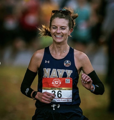 WASHINGTON, D.C., UNITED STATES - Lt. Megan Walsh, psychiatry resident at Navy Medicine Readiness and Training Command (NMRTC) San Diego and All-Navy Marathon Team Captain, pushes through mile after mile at the Armed Forces National Marathon Championship in Washington D.C., Oct. 26, 2025. Walsh previously took the individual gold medal in 2024, and this year secured the bronze, leading the Navy Women’s Marathon team to their second consecutive victory. (U.S. Navy photo contributed)