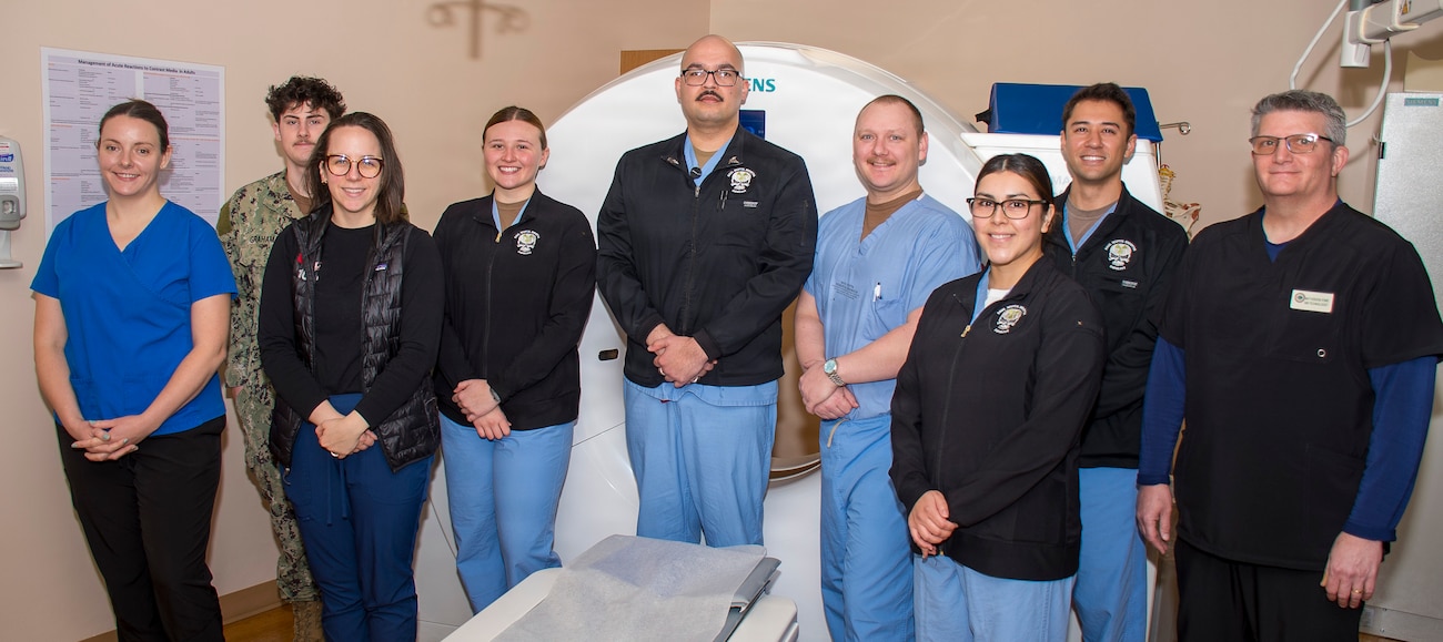 Radiology Department staff assigned to Naval Hospital Bremerton take a pause from their diagnostic exam cause after wrapping up National Radiologic Technology Week in early November to commemorate the essential contributions of military radiologic technologists while marking the 130th anniversary of Wilhelm Conrad Roentgen’s X-ray discovery. This year’s theme, “The Kaleidoscope of Radiologic Technology,” emphasized the multifaceted role of all Defense Health Agency military treatment facility Radiology Department staff who support operational readiness, medical diagnosis, and military healthcare (Official Navy photo by Mass Communication Specialist 2nd Class Jennifer Benedict, NHB/NMRTC Bremerton public affairs).