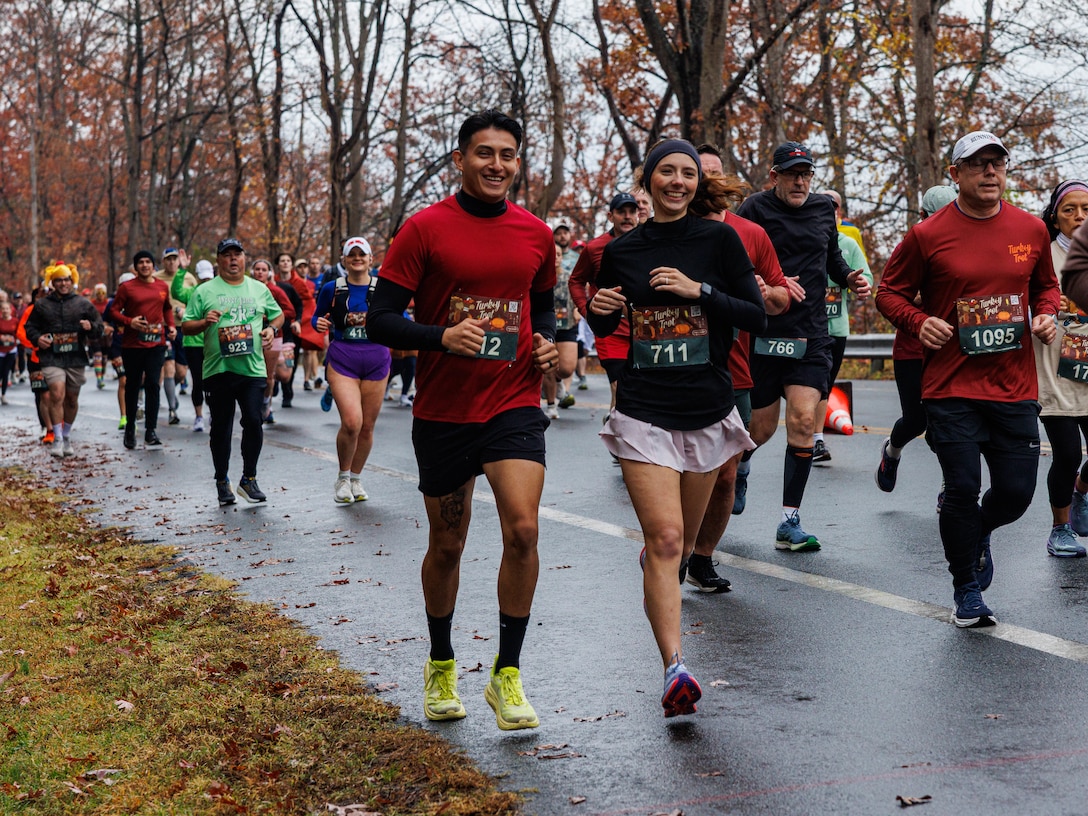 Participants of the Marine Corps Marathon 10k Turkey Trot, runs the course on Marine Corps Base Quantico, Virginia, Nov. 22, 2025. The MCM Turkey Trot 10k offers a final opportunity for families to come together and get their miles in before the upcoming holidays. (U.S. Marine Corps photo by Lance Cpl. Donovan E. Melendez)