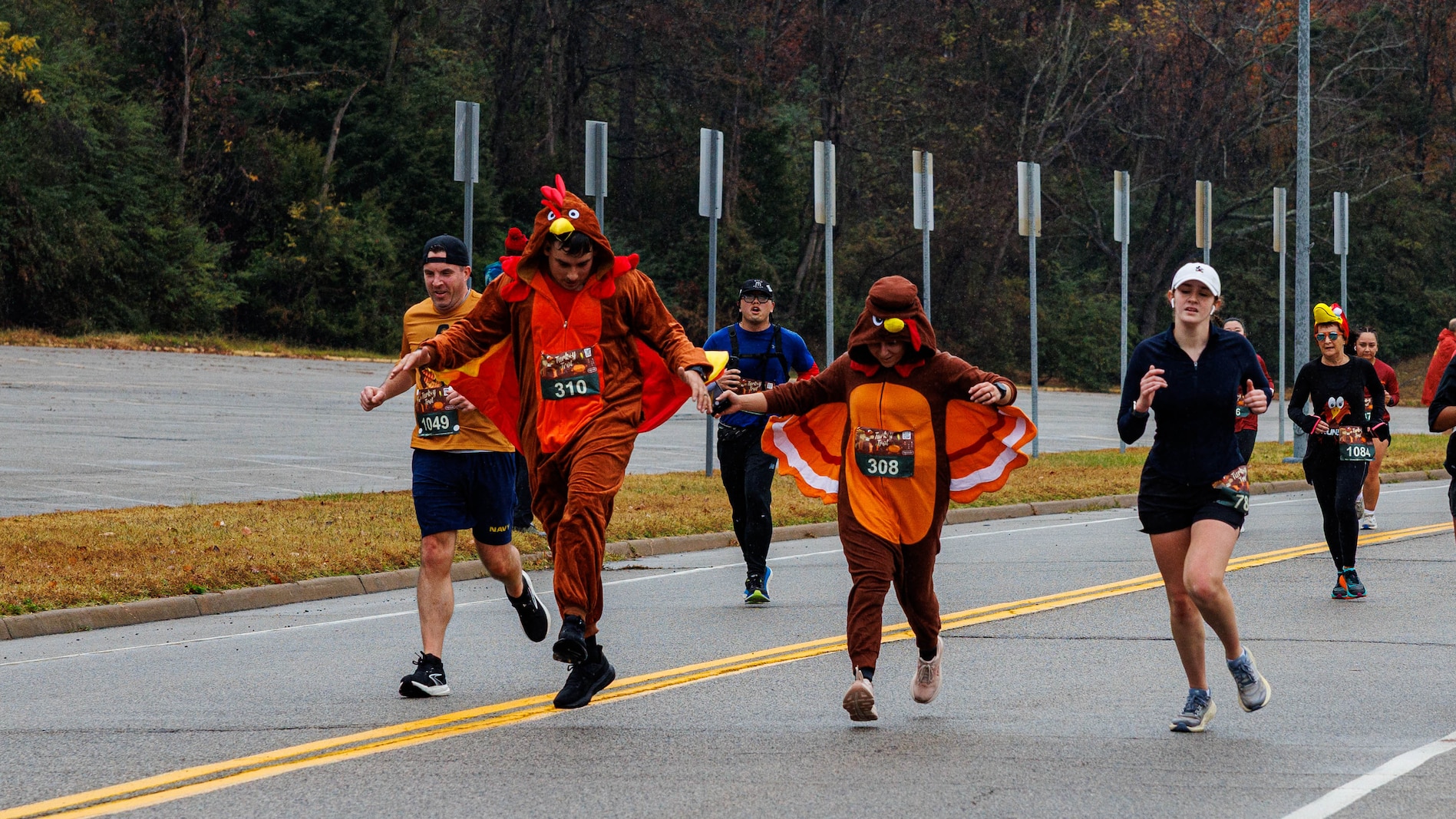 Participants of the Marine Corps Marathon 10k Turkey Trot, run the course on Marine Corps Base Quantico, Virginia, Nov. 22, 2025. The MCM Turkey Trot 10k offers a final opportunity for families to come together and get their miles in before the upcoming holidays. (U.S. Marine Corps photo by Lance Cpl. Donovan E. Melendez)