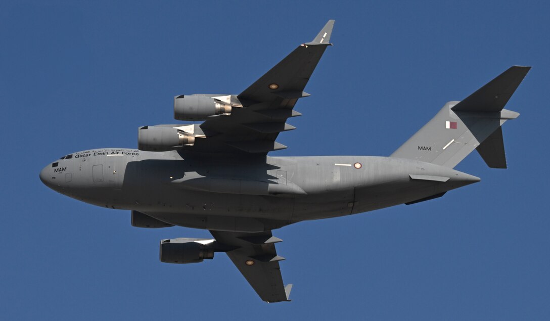 A Qatar Emiri Air Force C-17 conducts a flyover during exercise Ferocious Falcon live-fire demonstration within the U.S. Central Command area of responsibility, Nov. 20, 2025. Ferocious Falcon 6 is a biennial, Qatar-hosted multinational joint exercise designed to enhance lethality and combat efficiency among U.S. and allied forces. (U.S. Air Force photo by Senior Master Sgt. Richard P. Ebensberger)