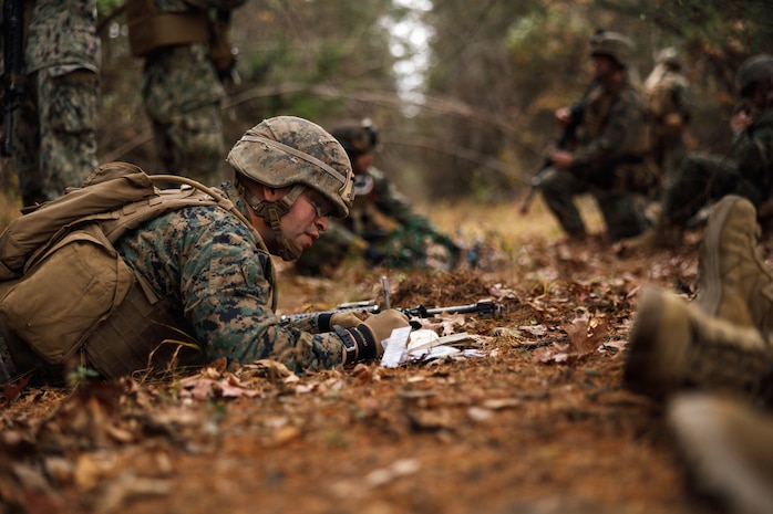 U.S. Marine Corps 2nd Lt. Leonel Cerezo, a student with Company D, Basic Officer Course 4-25, The Basic School, records the casualty count during the Warfighting Field Exercise a Marine Corps Base Quantico, Virginia, Nov. 18, 2025. The WARFEX serves as the culminating event at TBS, evaluating students’ proficiency in decision-making, small-unit tactics, and leadership as they operate under sustained physical and mental pressure in a realistic warfighting scenario. (U.S. Marine Corps photo by Cpl. Joshua Barker)