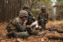 U.S. Marine Corps 2nd Lt. Michael Murphy, a student with Company D, Basic Officer Course 4-25, The Basic School, transmits nine-line for simulated casualties during the Warfighting Field Exercise at Marine Corps Base Quantico, Virginia, Nov. 18, 2025. The WARFEX serves as the culminating event at TBS, evaluating students’ proficiency in decision-making, small-unit tactics, and leadership as they operate under sustained physical and mental pressure in a realistic warfighting scenario. (U.S. Marine Corps photo by Cpl. Joshua Barker)