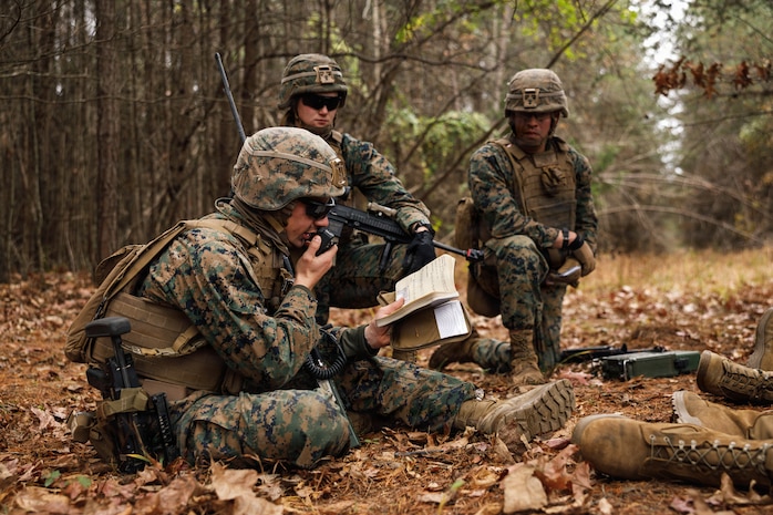 U.S. Marine Corps 2nd Lt. Michael Murphy, a student with Company D, Basic Officer Course 4-25, The Basic School, transmits nine-line for simulated casualties during the Warfighting Field Exercise at Marine Corps Base Quantico, Virginia, Nov. 18, 2025. The WARFEX serves as the culminating event at TBS, evaluating students’ proficiency in decision-making, small-unit tactics, and leadership as they operate under sustained physical and mental pressure in a realistic warfighting scenario. (U.S. Marine Corps photo by Cpl. Joshua Barker)