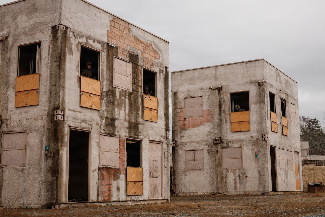 U.S. Marine Corps students with Company D, Basic Officer Course 4-25, The Basic School, provide suppressive fire during the Warfighting Field Exercise at Marine Corps Base Quantico, Virginia, Nov. 19, 2025. The WARFEX serves as the culminating event at TBS, evaluating students’ proficiency in decision-making, small-unit tactics, and leadership as they operate under sustained physical and mental pressure in a realistic warfighting scenario. (U.S. Marine Corps photo by Cpl. Joshua Barker)