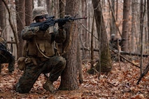 U.S. Marine Corps 2nd Lt. Alfonso Puma, a student with Company D, Basic Officer Course 4-25, The Basic School, Training Command, shoots an M4 carbine during the Warfighting Field Exercise at Marine Corps Base Quantico, Virginia, Nov. 18, 2025. The WARFEX serves as the culminating event at TBS, evaluating students’ proficiency in decision-making, small-unit tactics, and leadership as they operate under sustained physical and mental pressure in a realistic warfighting scenario. (U.S. Marine Corps photo by Cpl. Joshua Barker)