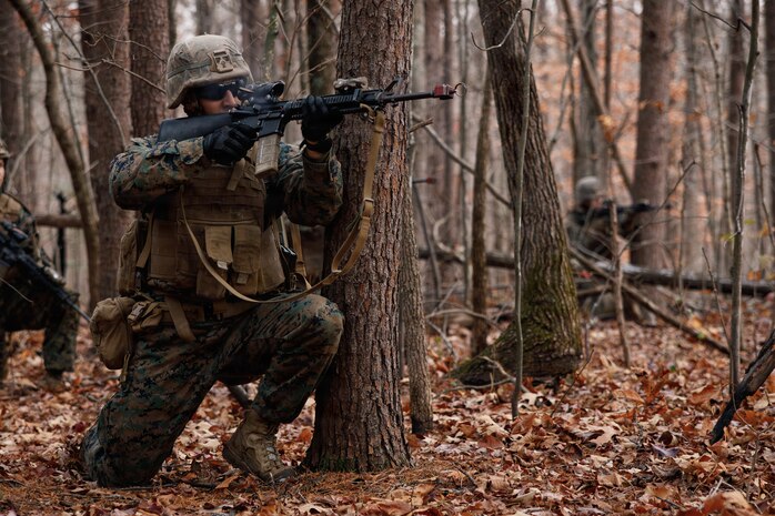 U.S. Marine Corps 2nd Lt. Alfonso Puma, a student with Company D, Basic Officer Course 4-25, The Basic School, Training Command, shoots an M4 carbine during the Warfighting Field Exercise at Marine Corps Base Quantico, Virginia, Nov. 18, 2025. The WARFEX serves as the culminating event at TBS, evaluating students’ proficiency in decision-making, small-unit tactics, and leadership as they operate under sustained physical and mental pressure in a realistic warfighting scenario. (U.S. Marine Corps photo by Cpl. Joshua Barker)
