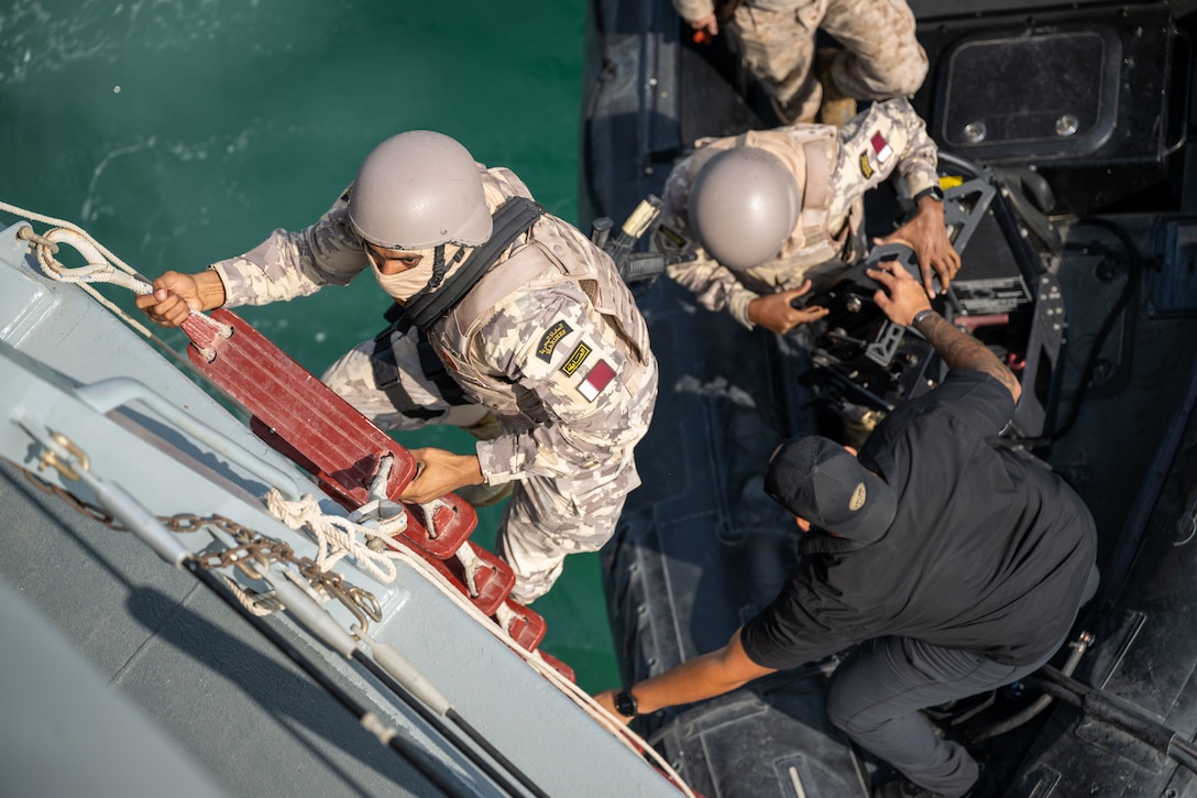 DOHA, Qatar (Nov. 18, 2025) A Qatari marine, assigned to the Qatari Emiri Navy, embarks onto the Qatari Barzan-class fast attack missile craft Al Deebel (Q07) during a close quarters combat training during Exercise Ferocious Falcon 6 in the U.S. Central Command area of responsibility. Ferocious Falcon 6 is a biennial, Qatar-hosted multinational joint exercise designed to enhance lethality and combat efficiency among U.S. and allied forces. (U.S. Navy photo by Mass Communication Specialist 2nd Class Iain Page)