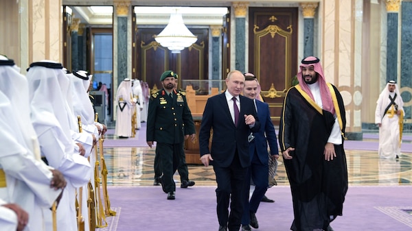 Russian President Vladimir Putin and Saudi Crown Prince Mohammed bin Salman attend a welcoming ceremony ahead of their talks in Riyadh, Saudi Arabia, on Dec. 6.