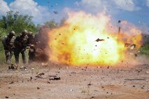 U.S. Marines with Battalion Landing Team 1/4, 31st Marine Expeditionary Unit, detonate a breaching charge during a demolition range at Camp Hansen, Okinawa, Japan, October 9, 2024. The demolition range was conducted in order to sustain readiness by improving individual skills with manufactured and constructed charges for the purposes of mobility and counter mobility. The 31st MEU, the Marine Corps’ only continuously forward-deployed MEU, provides a flexible and lethal force in ready to perform a wide range of military operations as the premiere crisis response force in the Indo-Pacific region. (U.S. Marine Corps photo by Cpl. Juan Maldonado)