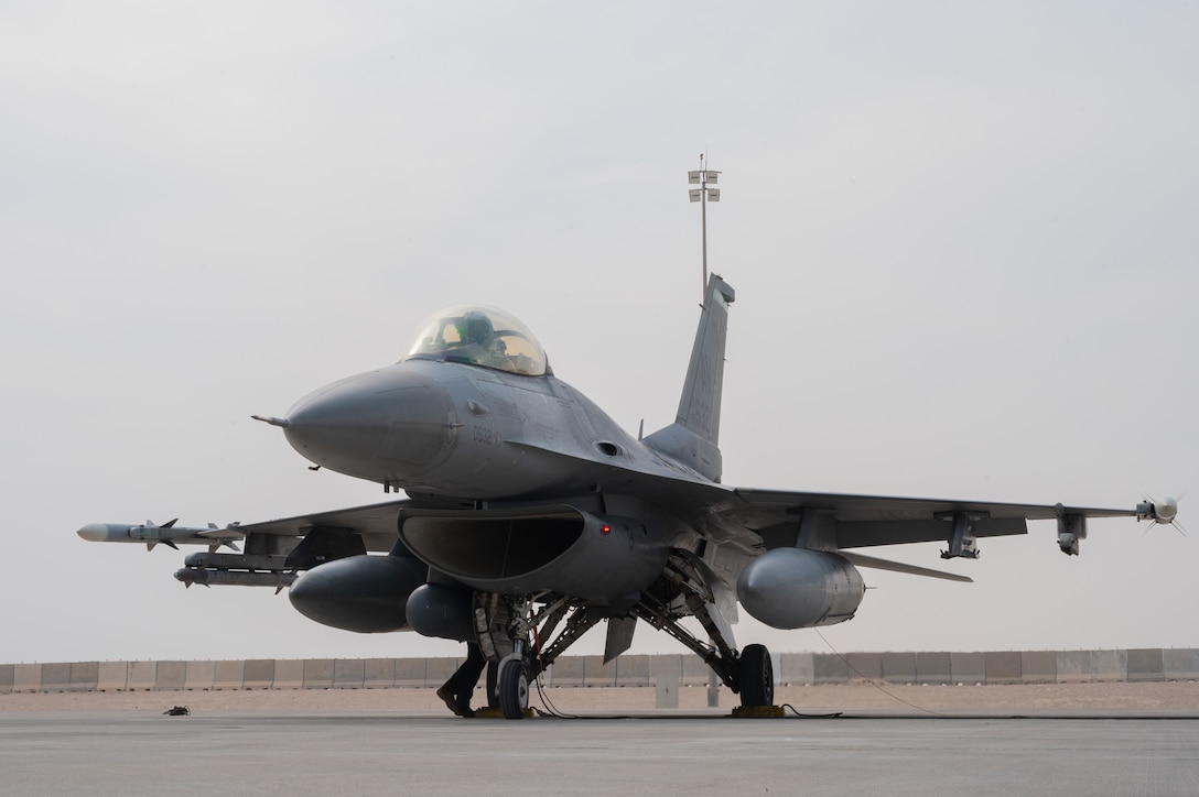 A U.S. Air Force F-16 Fighting Falcon aircraft pilot assigned to the 555th Expeditionary Fighter Squadron prepares to take fuel during exercise Ferocious Falcon 6 within the U.S. Central Command area of responsibility, Nov. 17, 2025. Ferocious Falcon 6 is a biennial, Qatar-hosted multinational joint exercise designed to enhance lethality and combat efficiency among U.S. and allied forces. (U.S. Air Force photo by Senior Airman Joseph Garcia)