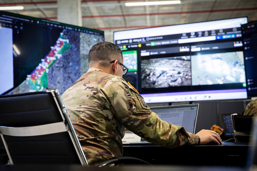 U.S. Army Col. Anthony Marante analyzes primary and alternate humanitarian aid routes at the Civil-Military Coordination Center on Nov. 21, 2025, in Israel. The United States is working with the international community to facilitate the flow of humanitarian assistance to civilians in Gaza. (U.S. Army Photo by Staff Sgt. Mike Ito)