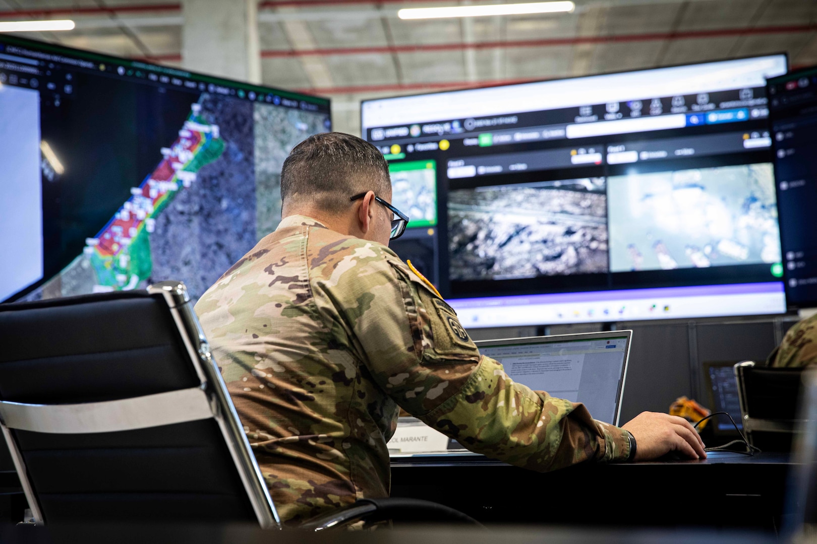 U.S. Army Col. Anthony Marante analyzes primary and alternate humanitarian aid routes at the Civil-Military Coordination Center on Nov. 21, 2025, in Israel. The United States is working with the international community to facilitate the flow of humanitarian assistance to civilians in Gaza. (U.S. Army Photo by Staff Sgt. Mike Ito)