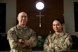 U.S. Air Force Capt. Jamie Osborne, 86th Airlift Wing chaplain, and Senior Airman Janet Aldaco-Thomas, 86th AW religious affairs journeyman, pose for a photo.