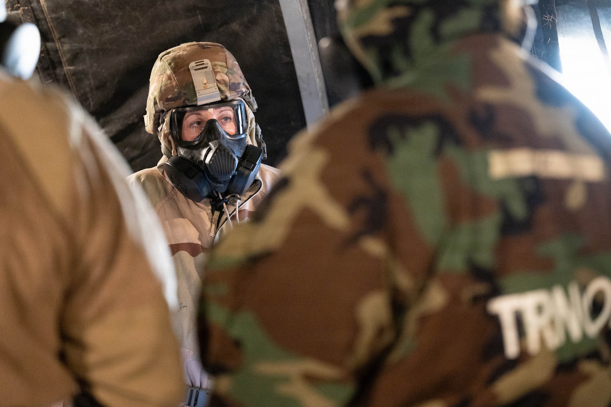 Photo of an Airman wearing Mission Oriented Protective Posture (MOPP) gear during an exercise.