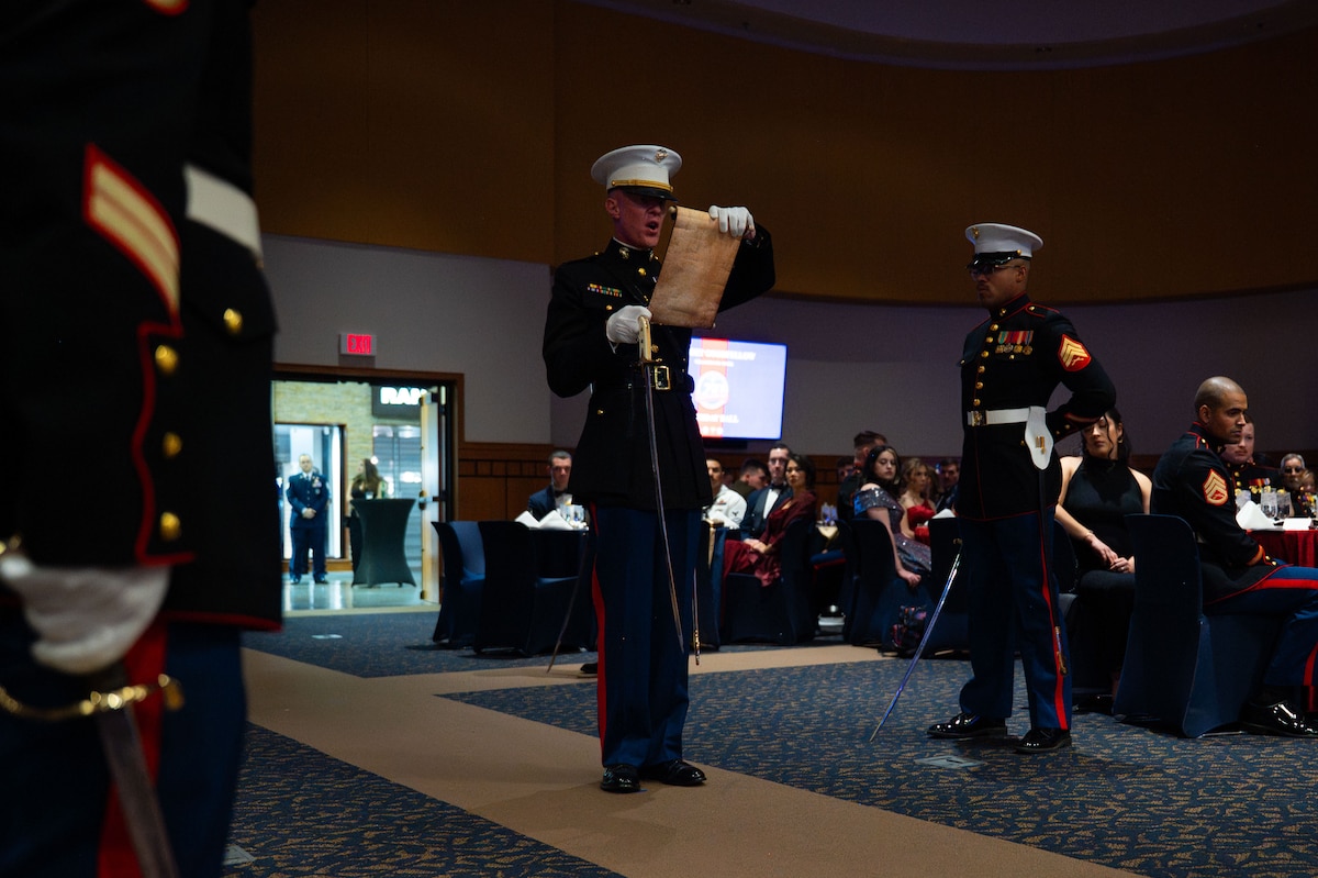 U.S. Marine Corps Chief Warrant Officer 3 Andrew Campbell, Marine Corps Detachment Goodfellow Intelligence School officer in charge, reads Marine Corps Order No. 47 during the 250th Marine Corps Ball at the CJ Davidson Conference Center in San Angelo, Texas, Nov. 22, 2025. Marine Corps Order No. 47 is a birthday message written by Maj. Gen. John A. Lejeune, the 13th Commandant of the U.S. Marine Corps. (U.S. Air Force photo by Airman 1st Class Brian Lummus)