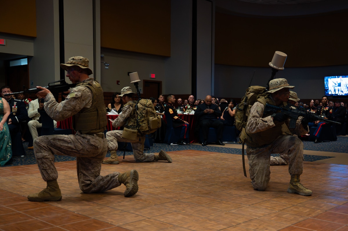 Students attached to Marines Corps Detachment Goodfellow display the equipment used by signal intelligence Marines during the 250th Marine Corps Ball at the CJ Davidson Conference Center in San Angelo, Texas, Nov. 22, 2025. Signals intelligence professionals are trained in intelligence, surveillance, reconnaissance systems, communication and electronic intelligence and cryptologic language analysis. (U.S. Air Force photo by Airman 1st Class Brian Lummus)