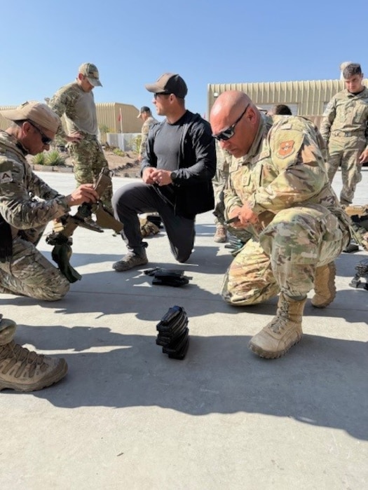 Spanish LEAP Scholar Senior Master Sgt. Pedro Estrada inspects partner forces magazines for live ammunition, before departing for an exercise mission during Southern Star 2025, to ensure the safety of the opposition team. Estrada was part of a group of 12 LEAP Scholars who were vital contributors to the two-week exercise. (Contributed photo)