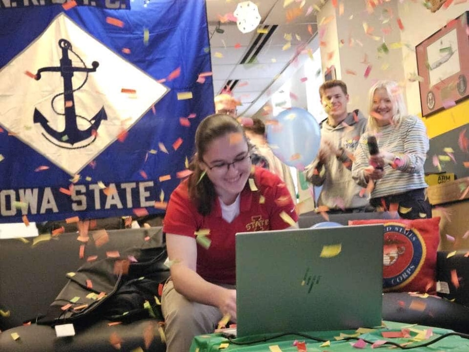 A midshipman celebrates with her peers after selecting her first ship assignment during the bi-annual ship selection event coordinated by Navy Personnel Command PERS-41 SWO Assignments. Naval Reserve Officers' Training Corps (NROTC) is under the charge of Naval Service Training Command (NSTC), which oversees 98 percent of the Navy’s officer and enlisted accessions. NSTC, headquartered at Naval Station Great Lakes, Illinois, is the Foundry of America’s Fighting Force. NSTC transforms America’s sons and daughters into service professionals through Recruit Training Command, Officer Training Command Newport, and NROTC. Additionally, NSTC leads the Navy Junior ROTC citizenship development program, which instills leadership, character, and civic responsibility in high school students globally.