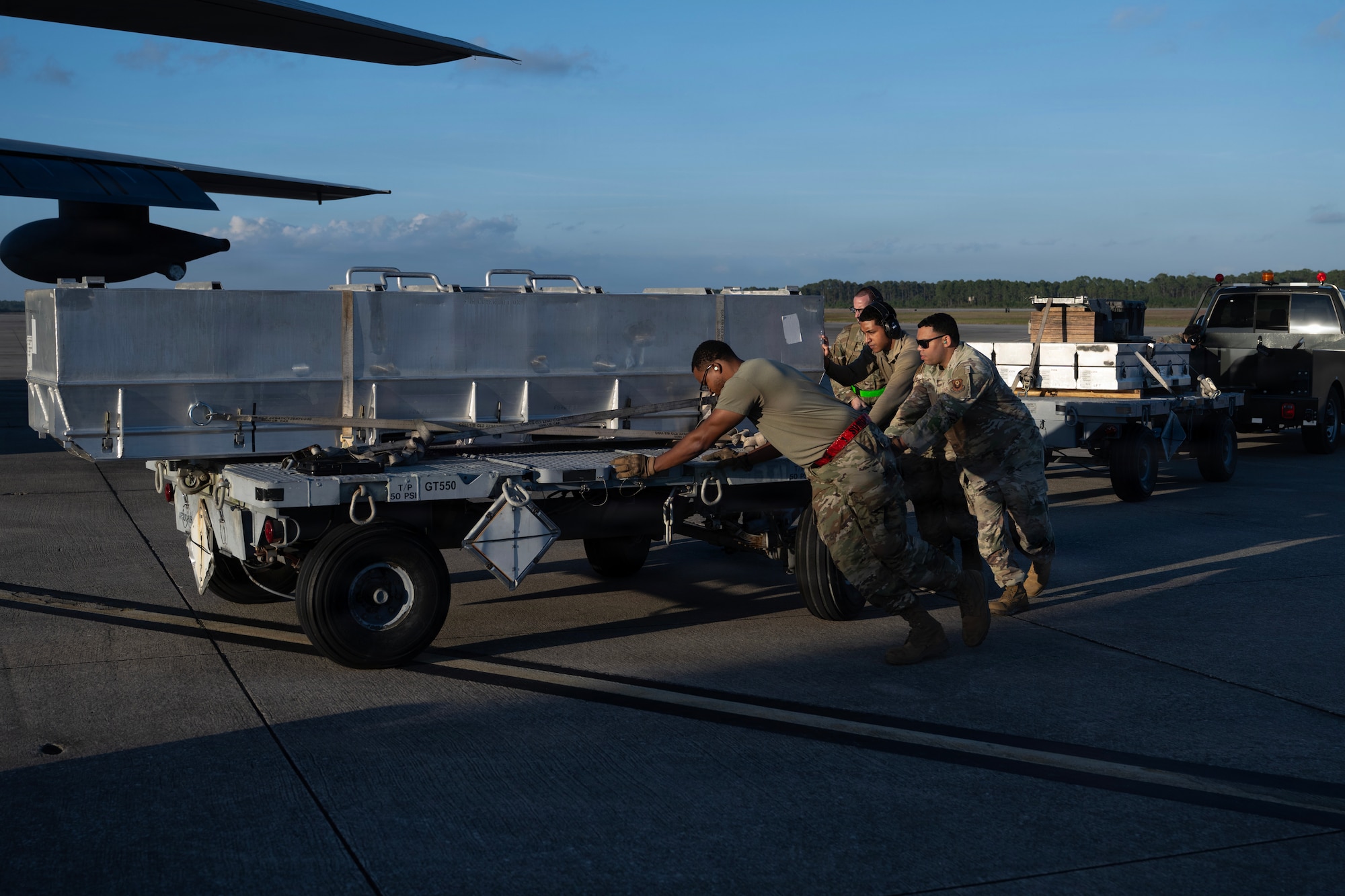 U.S. Air Force munitions systems specialists assigned to the 1st Special Operations Wing move munitions during an Ammo Advanced Performance Experience at Hurlburt Field, Florida, Nov. 5, 2025.