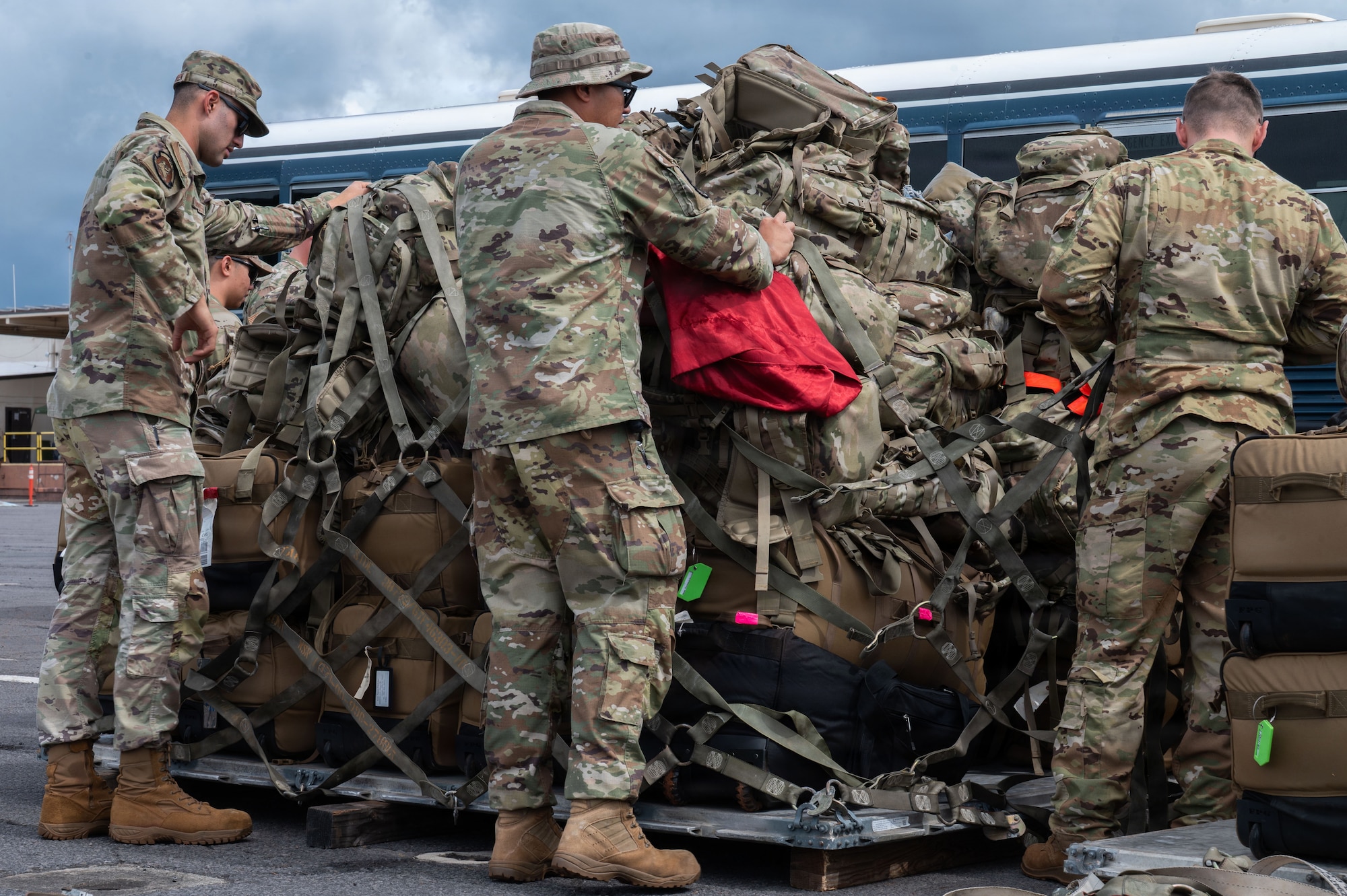 U.S. Airmen assigned to the 21st Combat Air Base Squadron prepare palletized luggage as they travel to a forward operating site during Joint Pacific Multinational Readiness Center 26-01 at Joint Base Pearl Harbor-Hickam, Hawaii, Nov. 2, 2025. Realistic training events like JPMRC 26-01 strengthen multinational interoperability and readiness while developing combat-credible formations to operate in contested environments across the Indo-Pacific. (U.S. Air Force photo by Senior Airman Alondra Cristobal Hernandez)