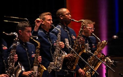The U.S. Air Force Band’s Airmen of Note play the national anthem at their 75th anniversary concert in Alexandria, Va., Sept. 26, 2025. Established in 1950 as the Air Force’s premier jazz band, the group has direct historical lineage to The U.S. Army Air Corps Band led by U.S. Army Maj. Glenn Miller during WWII. (U.S. Air Force photo by Staff Sgt. Jordan Powell)