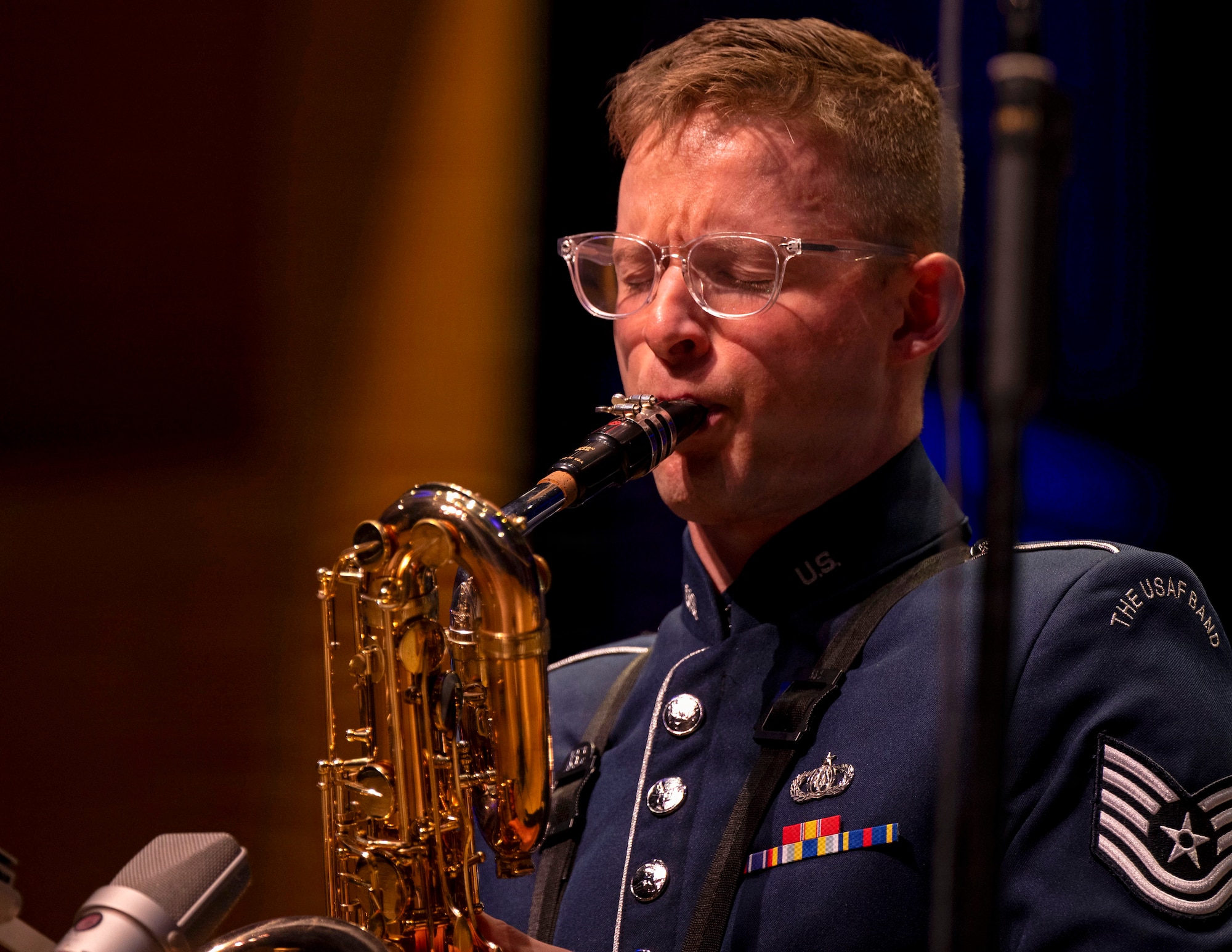 U.S. Air Force Tech. Sgt. Seth Ebersole, baritone saxophonist for the U.S. Air Force Band’s Airmen of Note, plays a solo during the group’s 75th anniversary concert in Alexandria, Va., Sept. 26, 2025. More than 20 alumni of the band attended to celebrate their heritage with approximately 1,000 audience members in attendance. (U.S. Air Force photo by Staff Sgt. Jordan Powell)